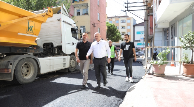 Bıyık, asfalt makinesiyle yolları asfaltladı